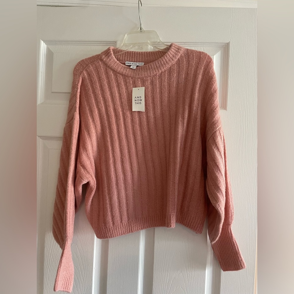 Pink sweater in size Small